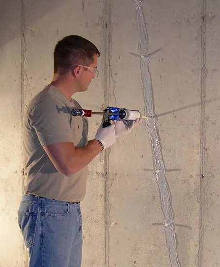 Waterproofing basement project that includes sealing a large foundation crack