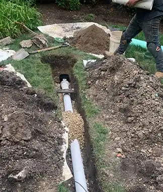 French drain system installed underground outside in Red Deer, Alberta