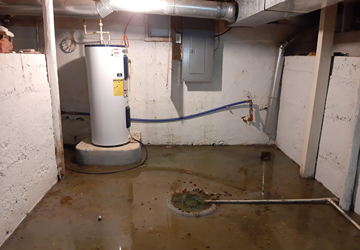 Flooded basement caused by a faulty sump pump